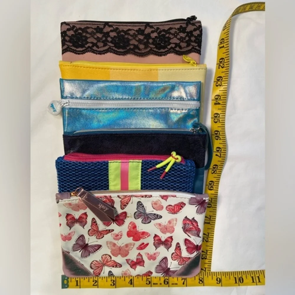 Ipsy, pouches with zipper, like‎ new, price is for all 6 items